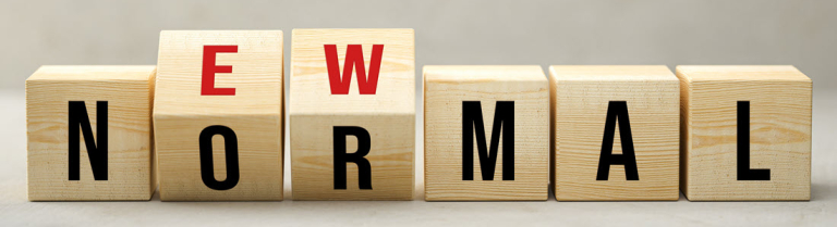 Holzwürfel mit den Buchstaben «New Normal» als Symbol für den CAS New Work in der Bildung des IDIB