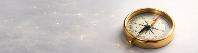 Goldener Kompass als Symbol für Orientierung und Ausrichtung der KI-Projekte des IDIB